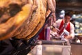 Professional jamon seller and cutter at work at the famous market at Barcelona, Catalonia, Spain 2019-04-30
