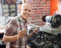 Professional key cutter making door keys copies Royalty Free Stock Photo