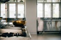 Professional kitchen in a modern restaurant features a shiny metal bowl on the Royalty Free Stock Photo