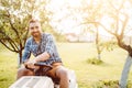 Professional landscaper using tractor at mowing lawn