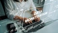 Professional at Laptop with Data Monetization Conceptual Graphics in Modern Workspace. Asymptotic smart data analytic Royalty Free Stock Photo