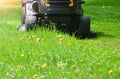 Professional lawn mower grass cutting close up Royalty Free Stock Photo
