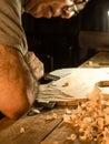 Professional luthier violinmaker artisan working on making a handmade violin with ancient tradtitional Stradivarius craftmanship