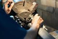 Professional machinist : man operating lathe grinding machine - metalworking industry concept. Mechanical Engineering control lath Royalty Free Stock Photo