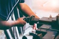 Professional machinist : man operating lathe grinding machine Royalty Free Stock Photo