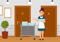 Professional maid standing at trolley with clean linen in hotel. Hotel room service worker in uniform, female Royalty Free Stock Photo