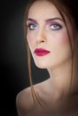 Professional make up - beautiful female art portrait with beautiful eyes. Elegance. Genuine natural woman in studio. Portrait Royalty Free Stock Photo