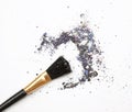 Professional make-up brush on mixed blue crushed eyeshadow Royalty Free Stock Photo