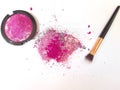 Pink make up powder on white background