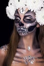 Professional make-up with flowers. Make up for Halloween.