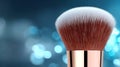 Professional makeup brush for beauty application close up of professional makeup brush with vibrant blue background Royalty Free Stock Photo