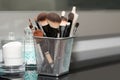 Professional makeup brushes set closeup near salon mirror. Brush any size for professional make-up artist on blur Royalty Free Stock Photo