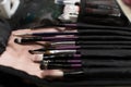 Professional makeup brushes set closeup near salon mirror Royalty Free Stock Photo