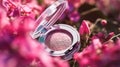 Professional makeup cosmetics, compact dry glitter shadows blush highlighter, flat lay with flowers, pink background