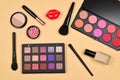 Professional makeup products with cosmetic beauty products, foundation, lipstick, eye shadows, eye lashes, brushes and tools