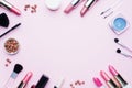 Professional makeup tools. Brushes lipstick blush eye shadow on a pink pastel background with copy space. Flat lay Royalty Free Stock Photo