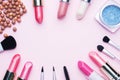 Professional makeup tools. Brushes lipstick blush eye shadow on a pink pastel background with copy space. Flat lay Royalty Free Stock Photo