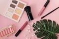 Professional makeup tools palette with brushes ,matt lipstick and accessories on pink background. Beauty girls concept. magazines Royalty Free Stock Photo