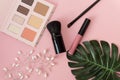Professional makeup tools palette of multicolor cosmetic make up set with brushes ,matt lipstick and accessories on pink Royalty Free Stock Photo