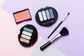 Professional makeup tools. Top view. Flat lay. Beauty, decorative cosmetics. Makeup brushes set and color eyeshadow