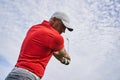 Professional male athlete improving his golf upswing