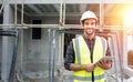 Professional male civil engineer or architect wear safety helmet. Engineer, inspector holding tablet technology for check list bui Royalty Free Stock Photo