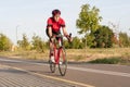 Professional Male Cyclist in Racing Outfit During a Ride Royalty Free Stock Photo