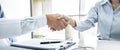 Professional Male doctor in white coat shaking hand with female patient after successful recommend treatment methods, Medicine and Royalty Free Stock Photo