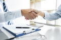 Professional Male doctor in white coat shaking hand with female patient after successful recommend treatment methods, Medicine and Royalty Free Stock Photo