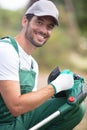 professional male gardener with strimmer Royalty Free Stock Photo