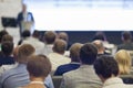 Professional Male Host Speaking in Front of the Audience During Business Conference