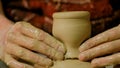 Professional male potter working in workshop, studio Royalty Free Stock Photo