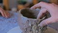 Professional male potter working in workshop, studio Royalty Free Stock Photo