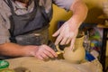 Professional male potter working in workshop, studio Royalty Free Stock Photo