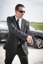 Professional male spy agent bodyguard with gun. Security police protection Royalty Free Stock Photo