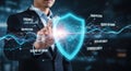 Cybersecurity expert protecting digital assets with futuristic glowing shield and data streams Royalty Free Stock Photo