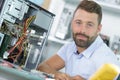 Professional man repairing and assembling computer desktop Royalty Free Stock Photo