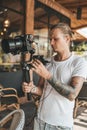 Professional man videographer with gimball video slr