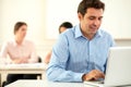 Professional man working and looking on his laptop Royalty Free Stock Photo