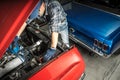 Professional Mechanic Restoring Classic Muscle Cars Royalty Free Stock Photo