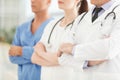 Only professional medical assistance. Cropped image of successful doctors team standing together with their arms crossed Royalty Free Stock Photo