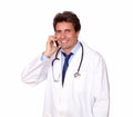 Professional medical doctor speaking on cellphone Royalty Free Stock Photo