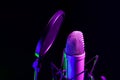 Professional microphone against black background in studio Royalty Free Stock Photo