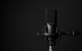 Professional microphone on black background. Royalty Free Stock Photo