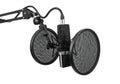 Professional microphone with pop filter and shock mount setup for recording studio Royalty Free Stock Photo