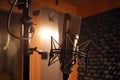 Professional microphone on stand in recording studio, closeup Royalty Free Stock Photo