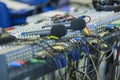 Professional Mixing Console Back Panel Closeup. Wireless Microphones on Foreground Royalty Free Stock Photo