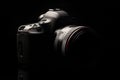 Professional modern DSLR camera low key image Royalty Free Stock Photo