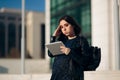 Stressed Working Pregnant Woman Holding a PC Tablet