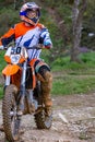 Professional Motocross Motorcycle Rider Drives Over the Road Track. Royalty Free Stock Photo